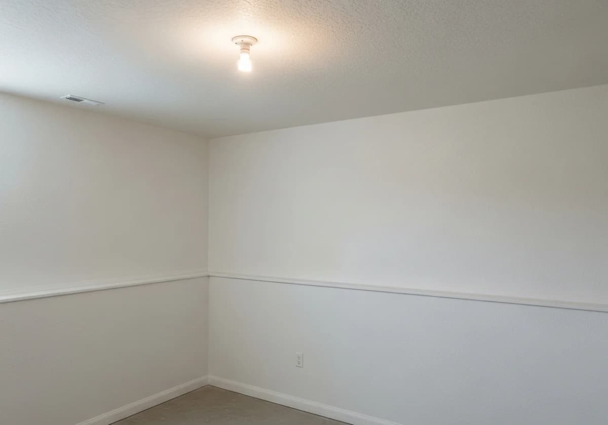 A plainly finished drywall room with a basic Level-4 paint-ready surface in a Boise home