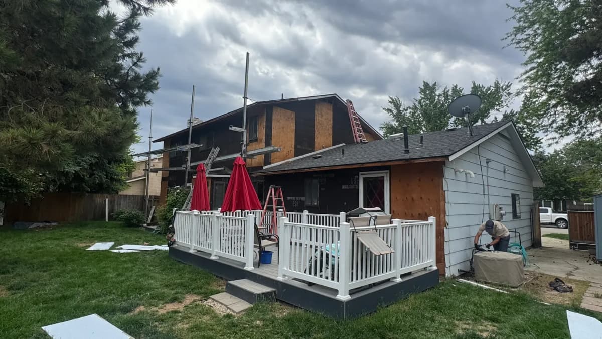 Boise home mid tear-off with house wrap going onto the rear addition